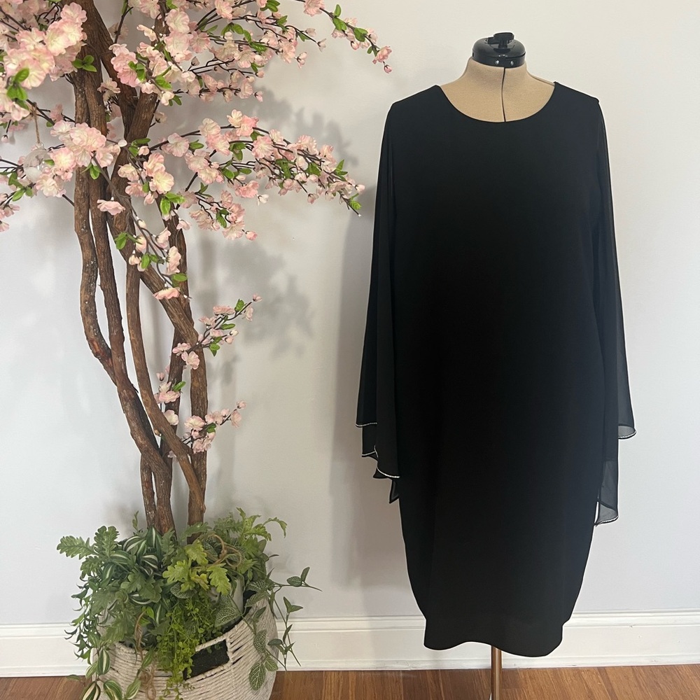 Black knew high dress. Illusion cap style sleeves.